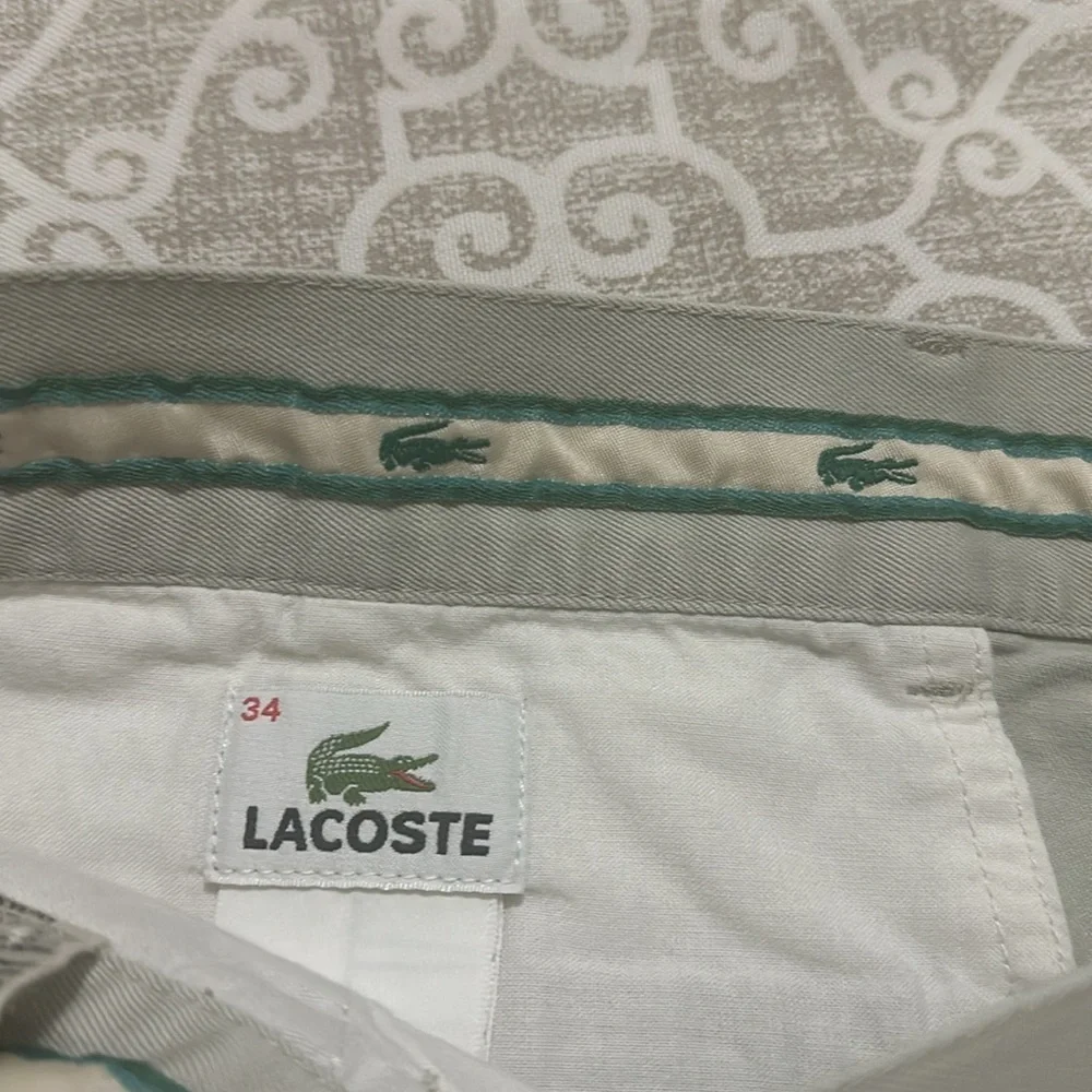 mens lacoste pleated shorts sz 34